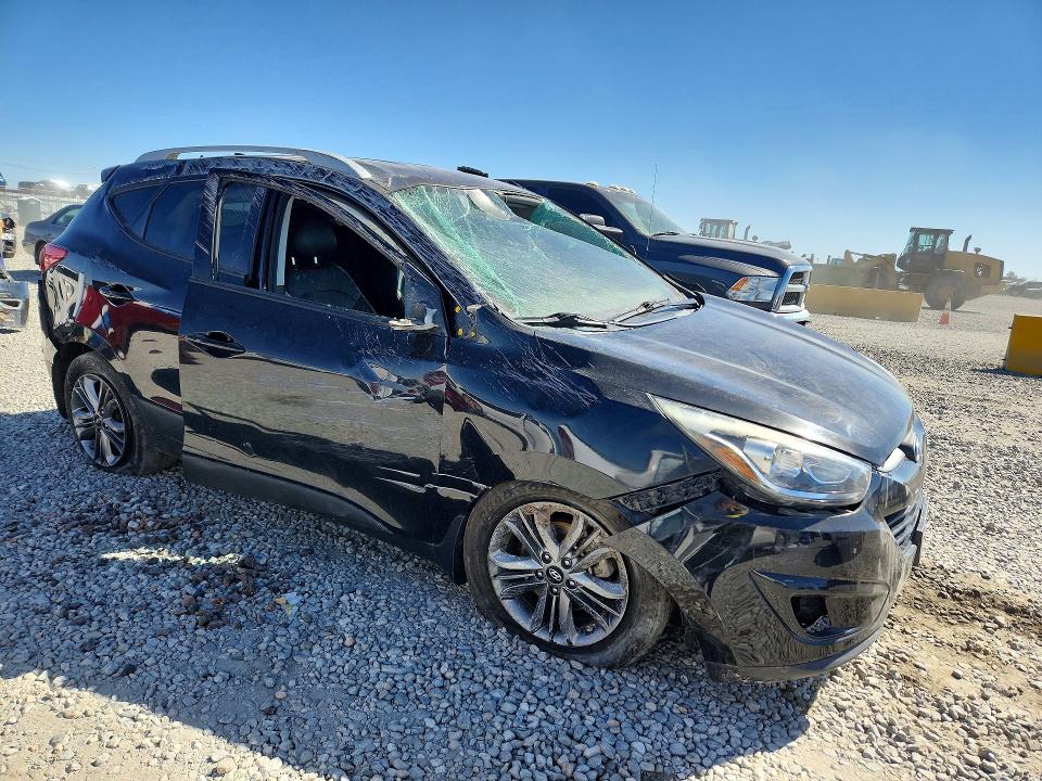 2014 Hyundai Tucson VIN KM8JUCAG9EU941500 COPART salvage auction — ROLLOVER, CO - PUBLIC - SALVAGE TITLE, sold $1,300 on 2026-07-02 (photo 4)