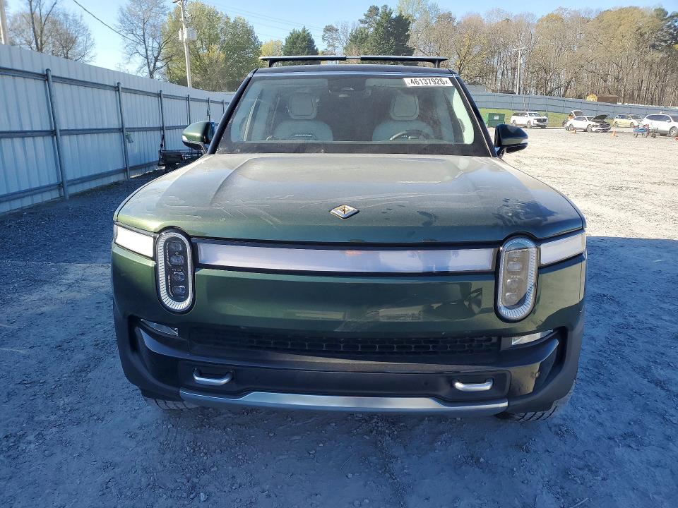 2024 Rivian VIN 7PDSGABA0RN033315 COPART salvage auction — REAR END, Nc - Salvage Certificate Of Title, sold $27,500 on 2026-07-08 (photo 5)