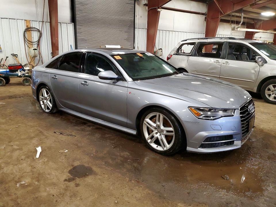 2016 Audi A6 VIN WAUFGAFC4GN025250 COPART salvage auction — WATER/FLOOD, MI - CERT OF TITLE-SALVAGE FLOOD, sold $3,009 on 2026-07-28 (photo 4)