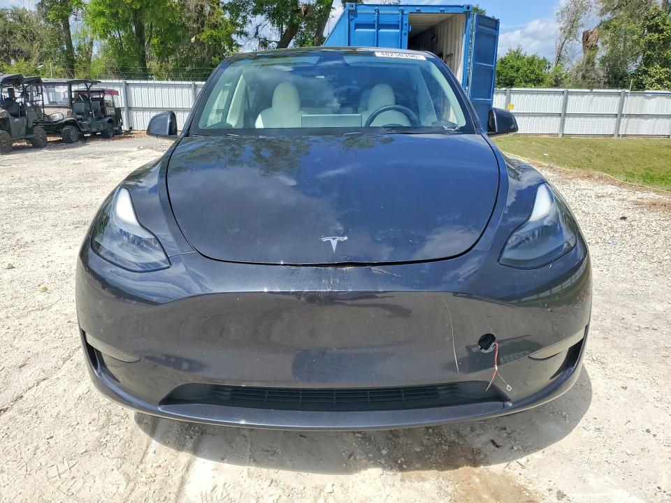 2024 Tesla Model y VIN 7SAYGAEE1RF045247 COPART salvage auction — REAR END, Fl - Cert Of Title Slvg Rebuildable, sold $10,700 on 2026-07-28 (photo 5)