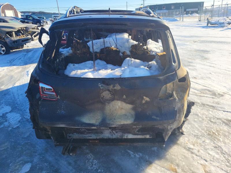 2016 Volkswagen Tiguan VIN WVGJV7AX8GW500565 COPART salvage auction — BURN, Nl - Non-Repairable, sold $80 on 2026-08-06 (photo 6)