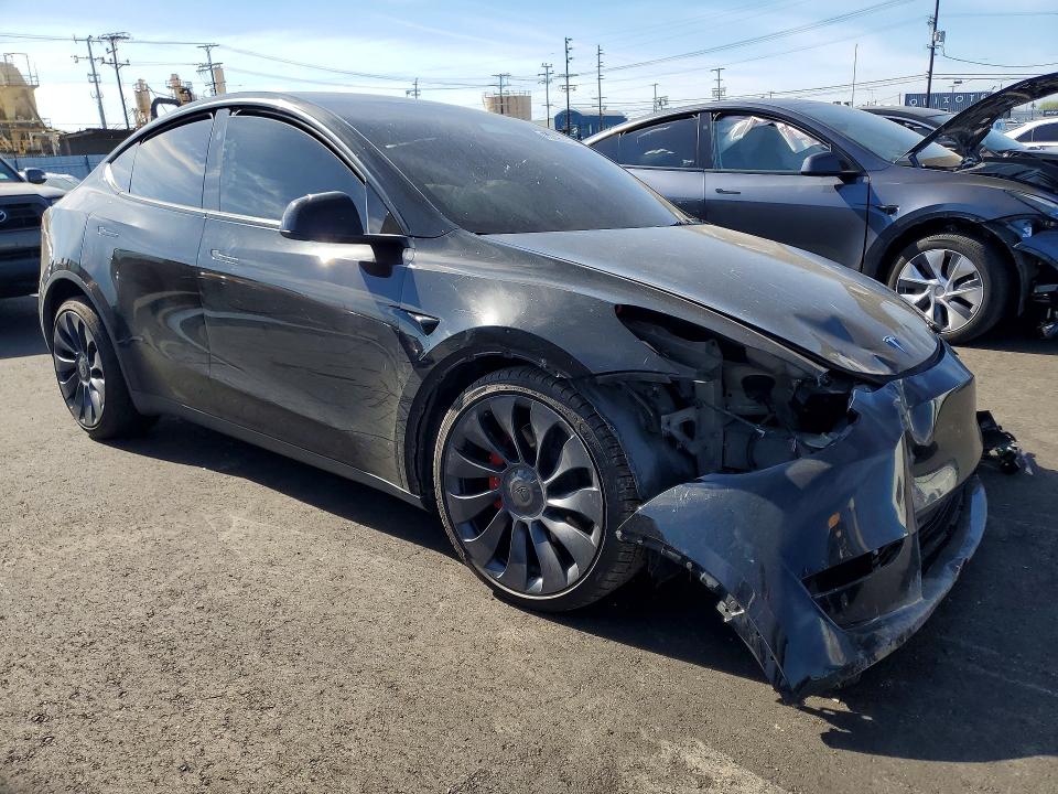 2024 Tesla Model y VIN 7SAYGDEF3RF111761 COPART salvage auction — FRONT END, CA - SALVAGE CERTIFICATE, sold $8,100 on 2026-07-15 (photo 4)