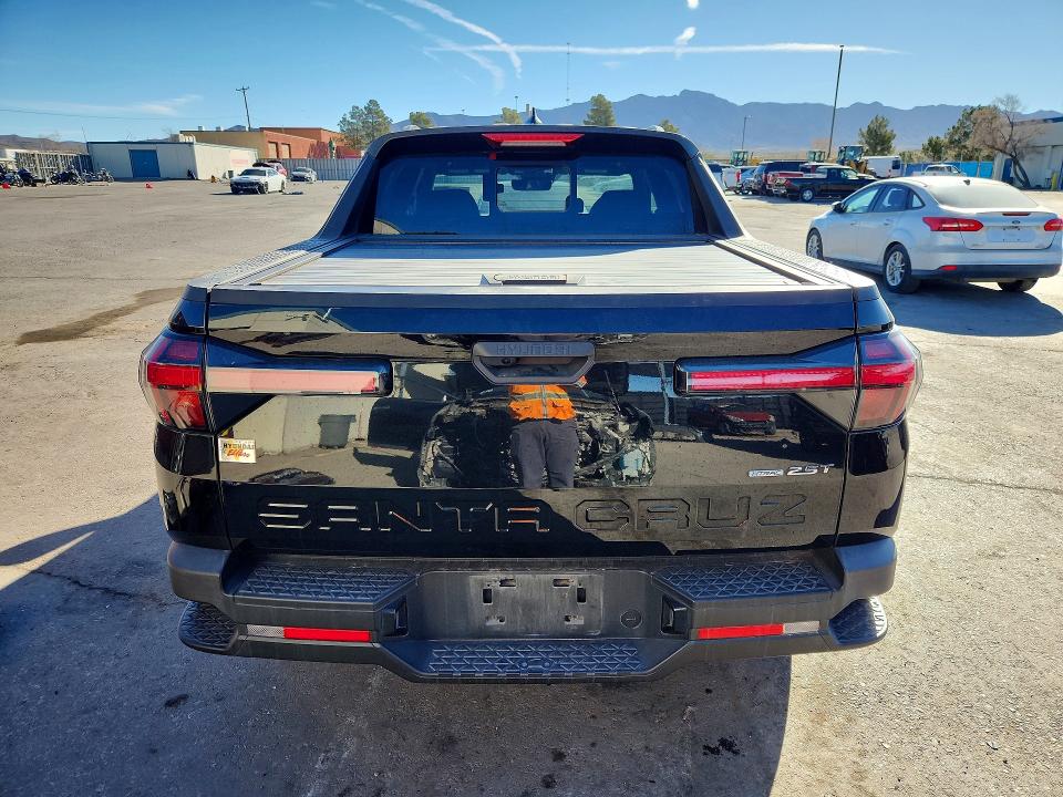 2022 Hyundai Santa cruz VIN 5NTJDDAF0NH005309 COPART salvage auction — SIDE, Salvage Title, sold $7,500 on 2026-07-17 (photo 6)