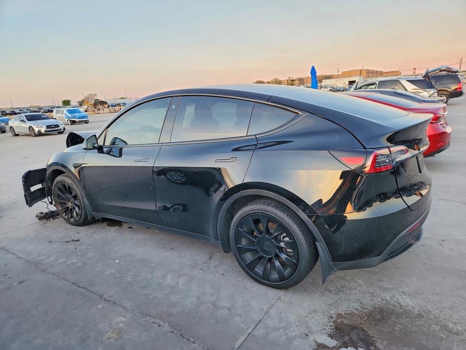 2023 Tesla Model y VIN 7SAYGDEE9PA094059 COPART salvage auction — FRONT END, TX - SALVAGE VEHICLE TITLE, sold $9,500 on 2026-08-03 (photo 2)