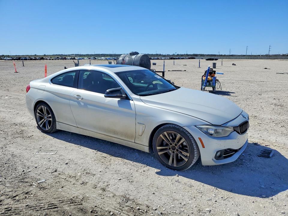 2015 BMW 4 series VIN WBA3R1C59FK194893 COPART salvage auction — MINOR DENT/SCRATCHES, Tx - Certificate Of Title (P), sold $3,750 on 2026-07-09 (photo 4)