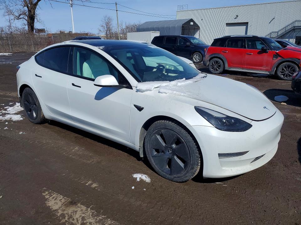2021 Tesla Model 3 VIN 5YJ3E1EA4MF982791 COPART salvage auction — SIDE, Qc - Gravement Accidente, sold $6,800 on 2026-07-14 (photo 4)