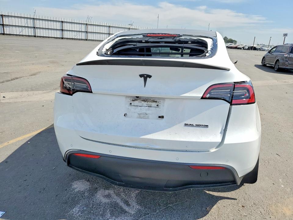 2022 Tesla Model y VIN 7SAYGDEF9NF522821 COPART salvage auction — FRONT END, Ca - Salvage Certificate, sold $4,100 on 2026-07-13 (photo 6)
