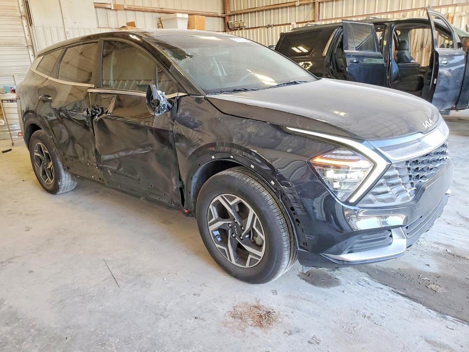 2025 Kia Sportage VIN KNDPU3DF2S7369228 COPART salvage auction — SIDE, Tx - Salvage Vehicle Title, sold $7,200 on 2026-07-10 (photo 4)