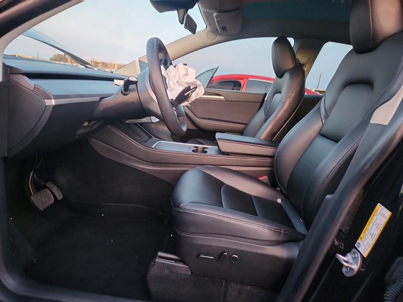 2023 Tesla Model y VIN 7SAYGDEE9PA094059 COPART salvage auction — FRONT END, TX - SALVAGE VEHICLE TITLE, sold $9,500 on 2026-08-03 (photo 7)