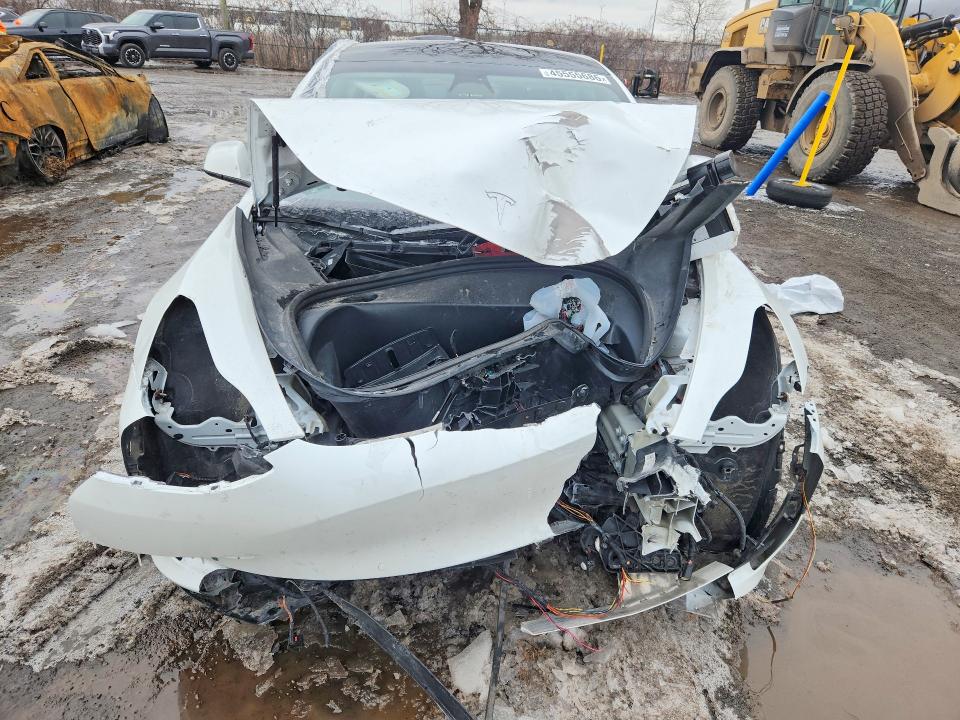 2022 Tesla Model 3 VIN 5YJ3E1EB1NF271124 COPART salvage auction — FRONT END, Qc - Gravement Accidente, sold $4,100 on 2026-07-07 (photo 5)