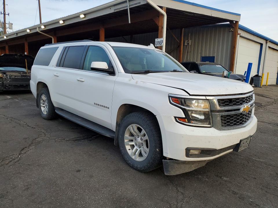 2020 Chevrolet Suburban VIN 1GNSKHKC0LR300069 COPART salvage auction — MINOR DENT/SCRATCHES, Co - Dis/Dlr/Exp Only Clean Title (P), sold $10,700 on 2026-07-09 (photo 4)