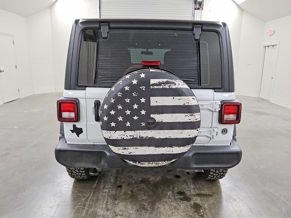 2025 Jeep Wrangler / VIN 1C4PJXDN3SW552358 COPART salvage auction — MINOR DENT/SCRATCHES, Tx - Certificate Of Title, sold $23,500 on 2026-07-09 (photo 6)