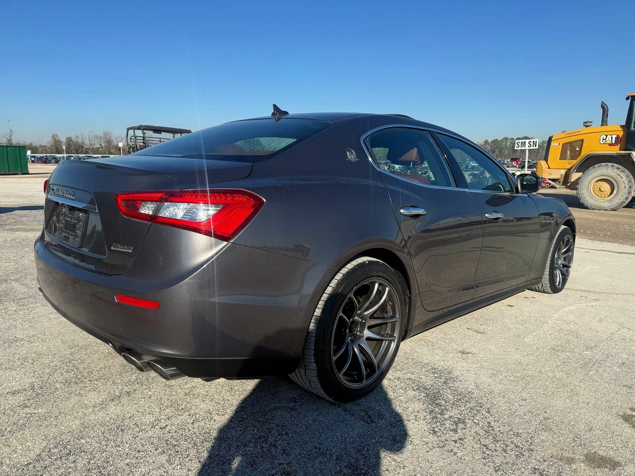 2017 Maserati Ghibli VIN ZAM57XSA9H1206127 COPART salvage auction — Damage History, Tx - Salvage Cert-Manufacturer Buyb (P), sold $25,000 on 2026-04-13 (photo 4)