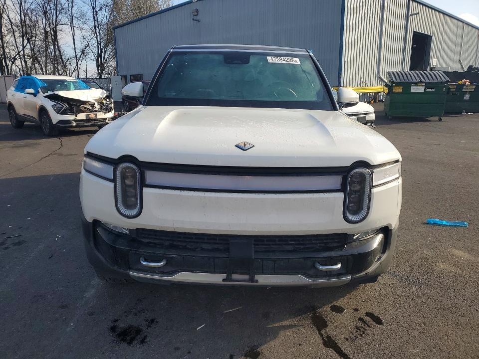 2023 Rivian R1s VIN 7PDSGABA4PN017518 COPART salvage auction — SIDE, Or - Salvage Title Certificate, sold $23,200 on 2026-07-13 (photo 5)