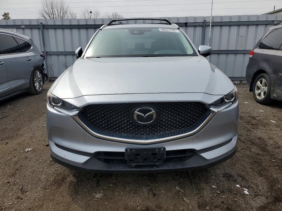 2019 Mazda Cx-5 VIN JM3KFBCM6K0601795 COPART salvage auction — SIDE, Salvage Title, sold $9,400 on 2026-07-16 (photo 5)