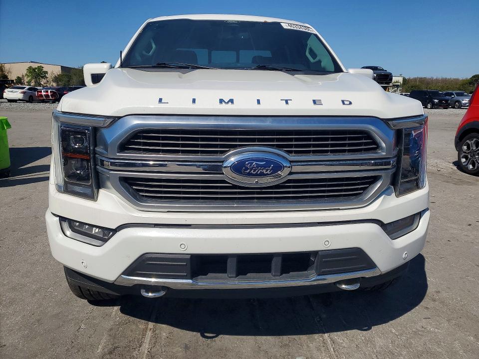 2021 Ford F-150 Lightning VIN 1FTFW1ED9MFB46636 COPART salvage auction — Burn Engine, FL - CERT OF TITLE SLVG REBUILDABLE, sold $19,100 on 2026-04-28 (photo 5)
