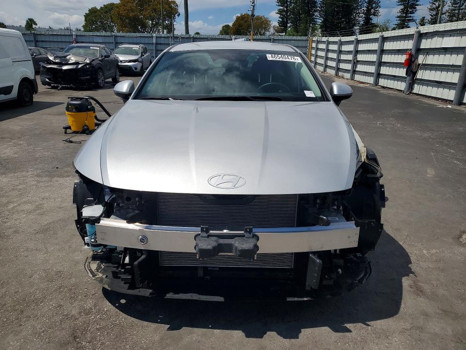 2026 Hyundai Sonata VIN KMHL64JA4TA525616 COPART salvage auction — SIDE, Salvage Title, sold $6,800 on 2026-07-27 (photo 5)