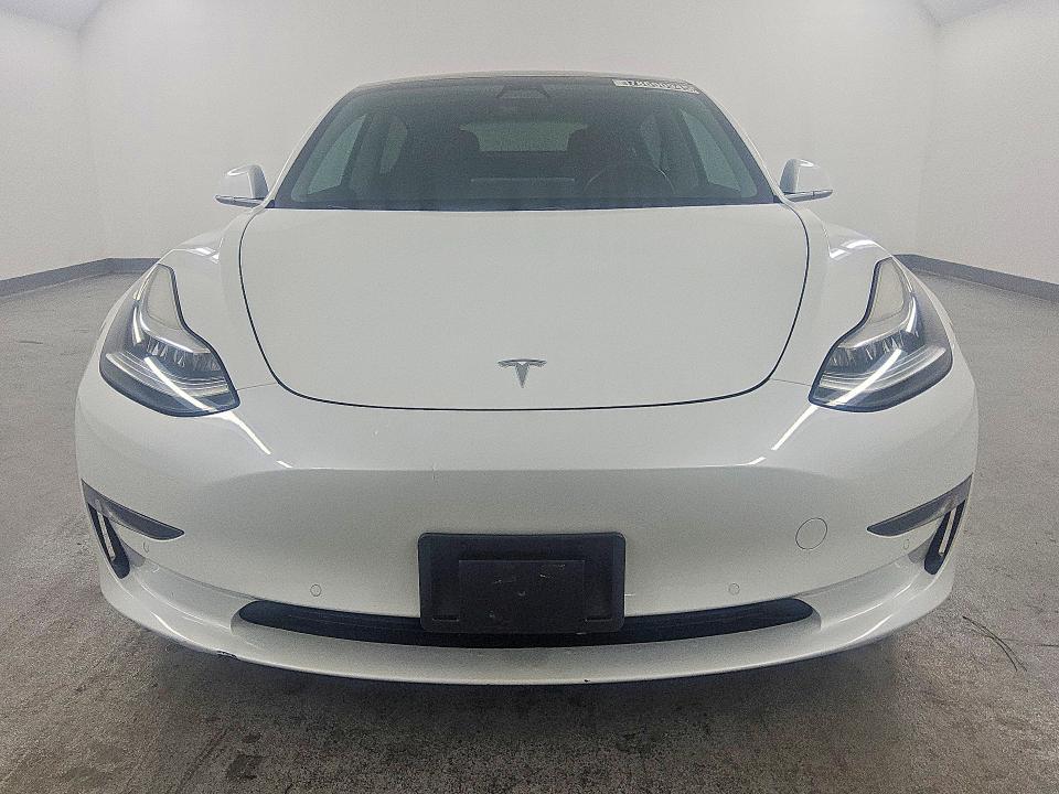 2019 Tesla Model 3 VIN 5YJ3E1EA2KF397351 COPART salvage auction — NORMAL WEAR, TX - CERTIFICATE OF TITLE (P), sold $14,000 on 2026-09-08 (photo 5)