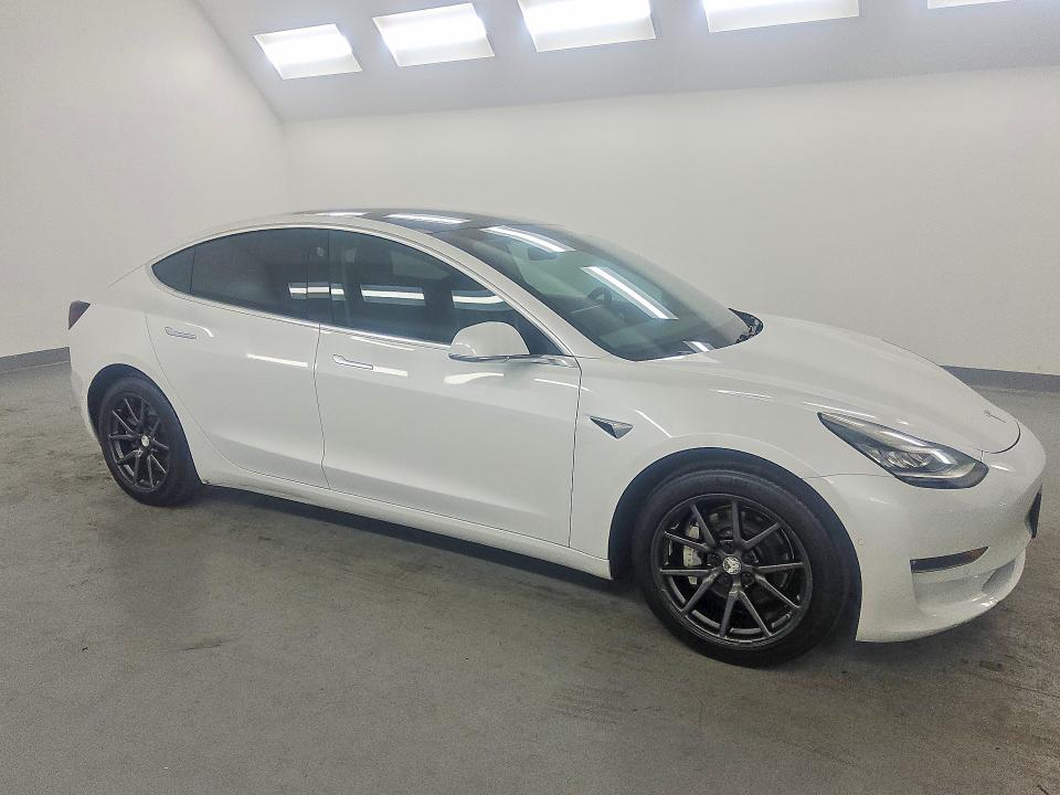 2019 Tesla Model 3 VIN 5YJ3E1EA2KF397351 COPART salvage auction — NORMAL WEAR, TX - CERTIFICATE OF TITLE (P), sold $14,000 on 2026-09-08 (photo 4)