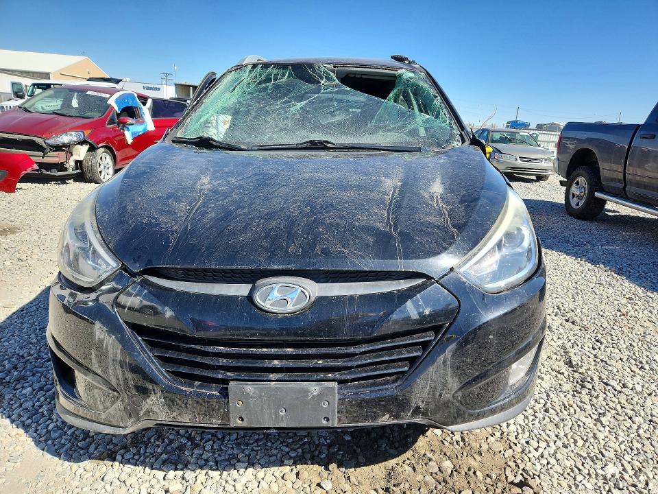 2014 Hyundai Tucson VIN KM8JUCAG9EU941500 COPART salvage auction — ROLLOVER, CO - PUBLIC - SALVAGE TITLE, sold $1,300 on 2026-07-02 (photo 5)