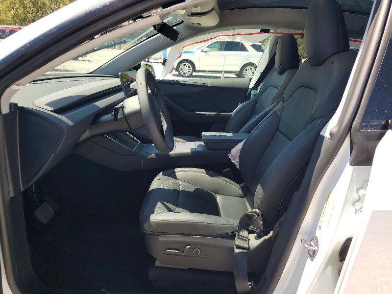 2026 Tesla Model y VIN 7SAYGDEE4TA449584 COPART salvage auction — SIDE, Tx - Certificate Of Title, sold $20,800 on 2026-09-22 (photo 7)
