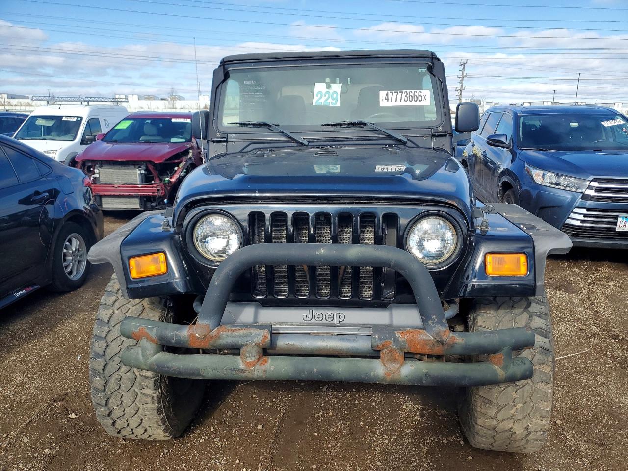 2004 Jeep Wrangler VIN 1J4FA49S84P801236 COPART salvage auction — Minor Dent/Scratches, IL - CERT OF TITLE-REBUILT, sold $2,950 on 2026-07-09 (photo 5)