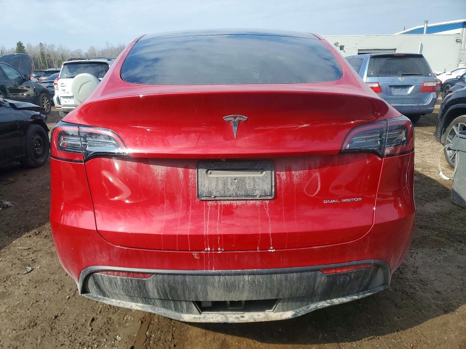 2023 Tesla Model y VIN 7SAYGDEE2PF761685 COPART salvage auction — SIDE, ON - PERMIT NO BRAND - UNFIT, sold $18,450 on 2026-07-16 (photo 6)