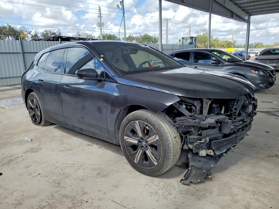 2024 BMW Ix VIN WB523CF03RCP19890 COPART salvage auction — FRONT END, Salvage Title, sold $16,400 on 2026-07-15 (photo 4)