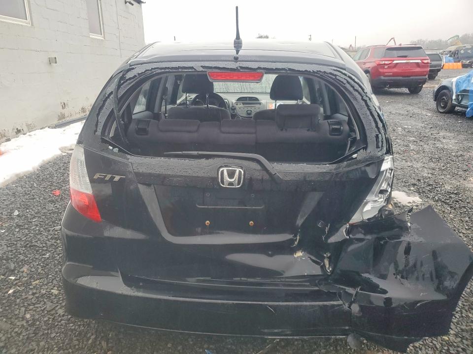 2009 Honda Fit VIN JHMGE88239S003530 COPART salvage auction — SIDE, CO - PUBLIC - SALVAGE TITLE, sold $800 on 2026-07-24 (photo 6)