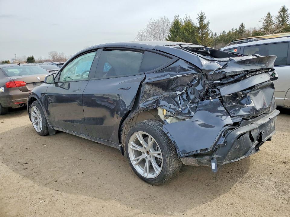 2026 Tesla Model y VIN XP7YGDEEXTB774125 COPART salvage auction — REAR END, On - Permit Salvage, sold $12,100 on 2026-08-04 (photo 2)