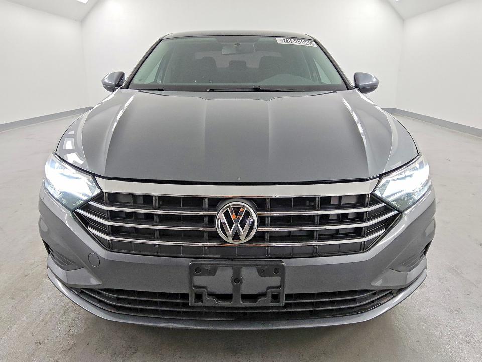 2021 Volkswagen Jetta VIN 3VWC57BU4MM019027 COPART salvage auction — NORMAL WEAR, TX - CERTIFICATE OF TITLE, sold $10,400 on 2026-09-08 (photo 5)