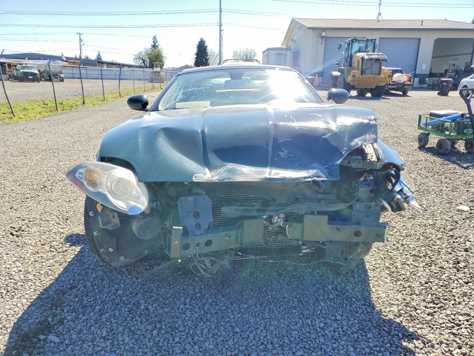 2007 Jaguar Xk VIN SAJDA44BX75B03882 COPART salvage auction — FRONT END, Or - Salvage Title Certificate, sold $925 on 2026-07-07 (photo 5)