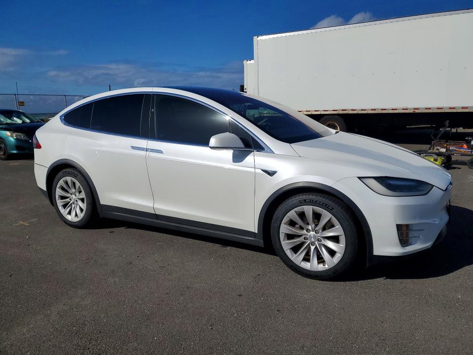 2017 Tesla Model x VIN 5YJXCAE26HF057192 COPART salvage auction — REAR END, Hi - Certificate Of Title, sold $150 on 2026-06-29 (photo 4)