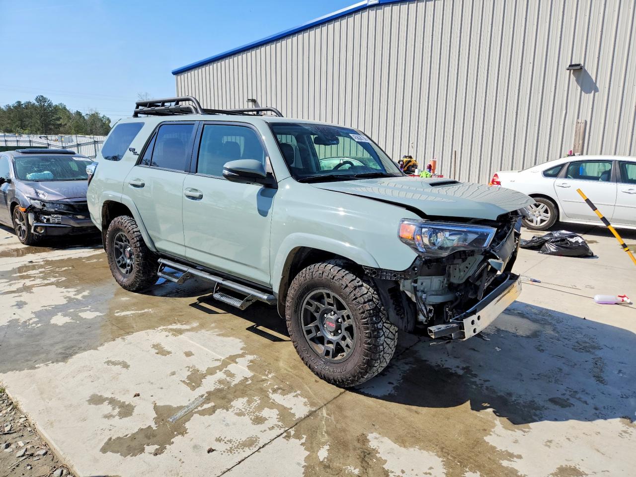 2023 Toyota 4Runner VIN JTERU5JR0P6124102 COPART salvage auction — Front End, GA - CERT OF TITLE-SALVAGE, sold $24,700 on 2026-07-09 (photo 4)