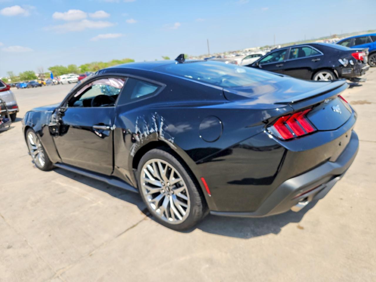 2025 Ford Mustang VIN 1FA6P8TH1S5121251 COPART salvage auction — Rollover, TX - CERTIFICATE OF TITLE, sold $6,400 on 2026-07-09 (photo 2)