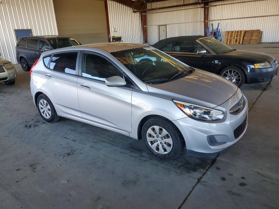 2017 Hyundai Accent VIN KMHCT5AE7HU325904 COPART salvage auction — MINOR DENT/SCRATCHES, Ca - Dis/Dlr/Exp Only Clean Title, sold $675 on 2026-07-30 (photo 4)