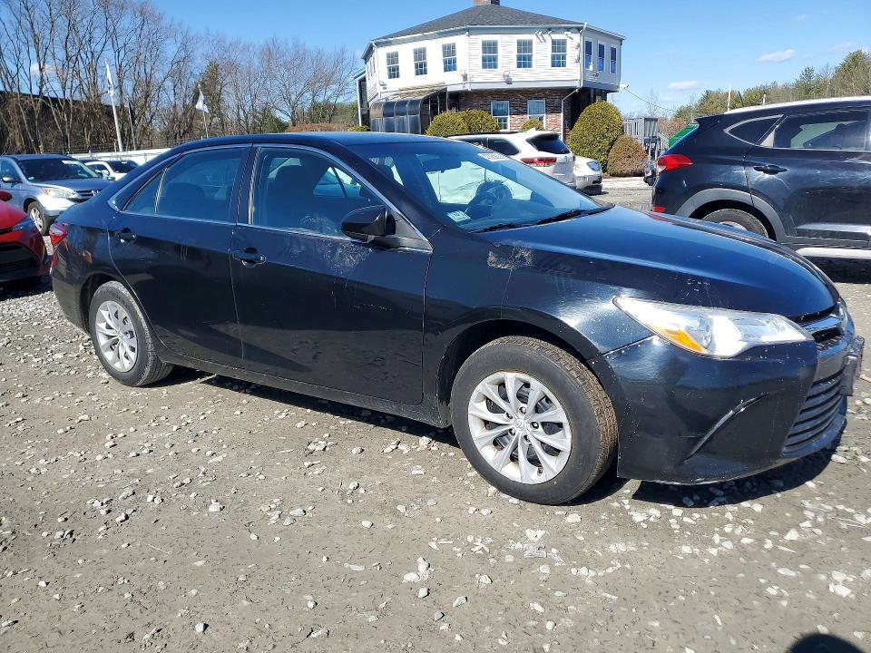 2016 Toyota Camry solara VIN 4T1BD1FK7GU185108 COPART salvage auction — MINOR DENT/SCRATCHES, Salvage Title, sold $400 on 2026-07-09 (photo 4)