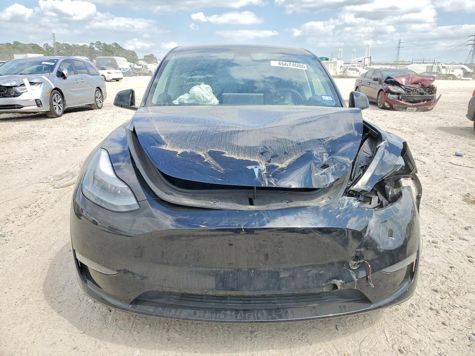 2024 Tesla Model y VIN 7SAYGDEEXRA299795 COPART salvage auction — FRONT END, Tx - Salvage Vehicle Title, sold $12,700 on 2026-07-10 (photo 5)