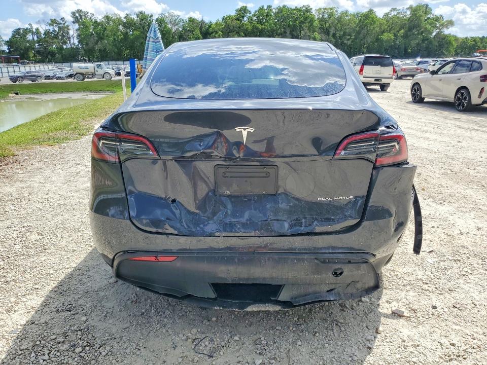 2024 Tesla Model y VIN 7SAYGAEE1RF045247 COPART salvage auction — REAR END, Fl - Cert Of Title Slvg Rebuildable, sold $10,700 on 2026-07-28 (photo 6)