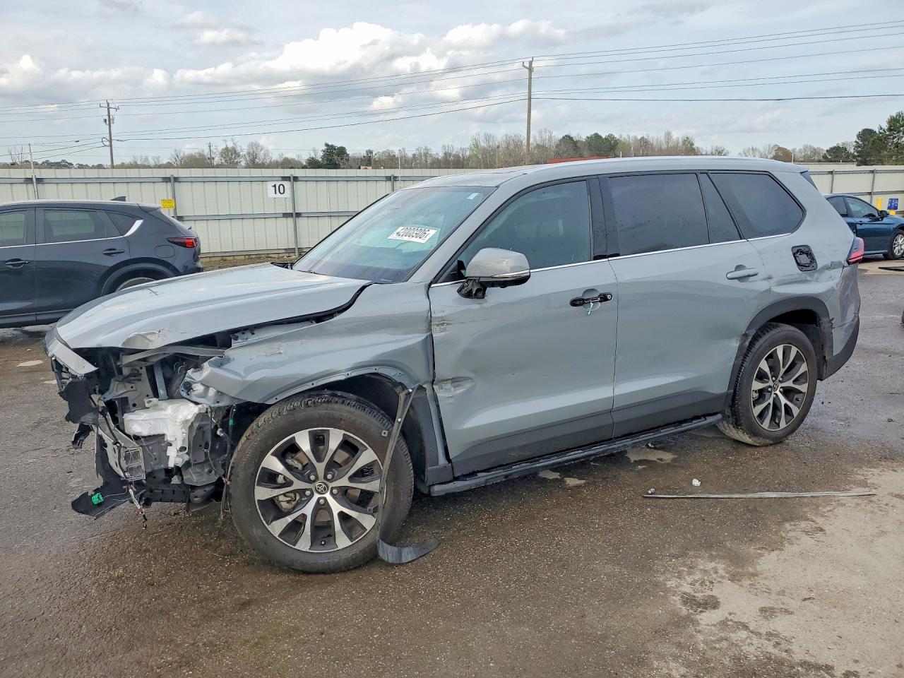 2025 Toyota Highlander VIN 5TDADAB50SS011068 COPART salvage auction — Front End, AL - CERT OF TITLE-SALVAGE TITLE, sold $18,300 on 2026-07-09 (photo 1)