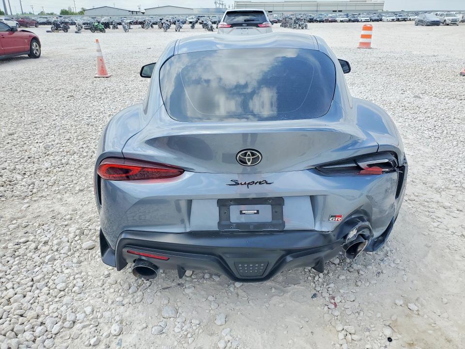 2022 Toyota Supra VIN WZ1DB0C0XNW050675 COPART salvage auction — SIDE, Tx - Salvage Vehicle Title, sold $20,100 on 2026-07-02 (photo 6)