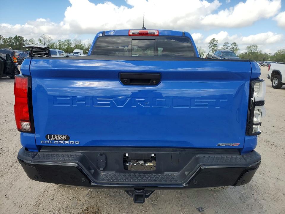 2025 Chevrolet Colorado VIN 1GCPTFEKXS1203008 COPART salvage auction — FRONT END, Tx - Salvage Vehicle Title, sold $16,400 on 2026-07-07 (photo 6)