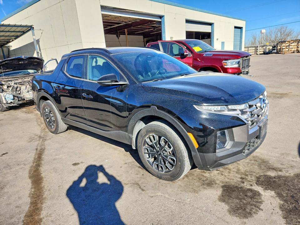 2022 Hyundai Santa cruz VIN 5NTJDDAF0NH005309 COPART salvage auction — SIDE, Salvage Title, sold $7,500 on 2026-07-17 (photo 4)