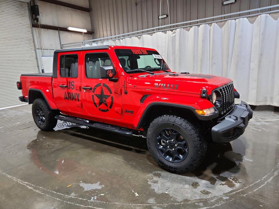 2023 Jeep Gladiator VIN 1C6HJTAG3PL567123 COPART salvage auction — NORMAL WEAR, Wv - Certificate Of Title, sold $25,250 on 2026-07-02 (photo 4)