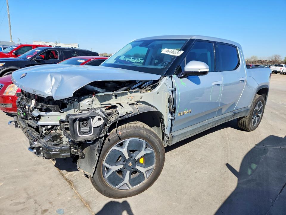 2023 Rivian R1t VIN 7FCTGAAA6PN021299 COPART salvage auction — FRONT END, TX - SALVAGE VEHICLE TITLE, sold $12,900 on 2026-07-09 (photo 1)