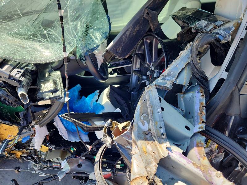 2018 Tesla Model 3 VIN 5YJ3E1EB1JF096061 COPART salvage auction — ALL OVER, Tx - Nonrepairable Title, sold $650 on 2026-07-13 (photo 7)