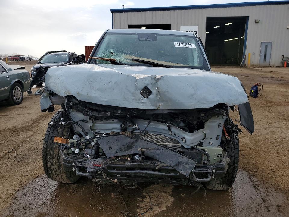 2025 Rivian R1t VIN 7FCTGBAA0SN040168 COPART salvage auction — ROLLOVER, Il - Salvage Certificate, sold $5,700 on 2026-07-07 (photo 5)