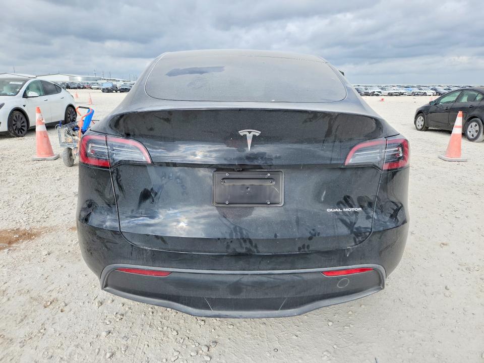 2024 Tesla Model y VIN 7SAYGAEE8RF116654 COPART salvage auction — SIDE, Tx - Salvage Vehicle Title, sold $13,000 on 2026-07-16 (photo 6)