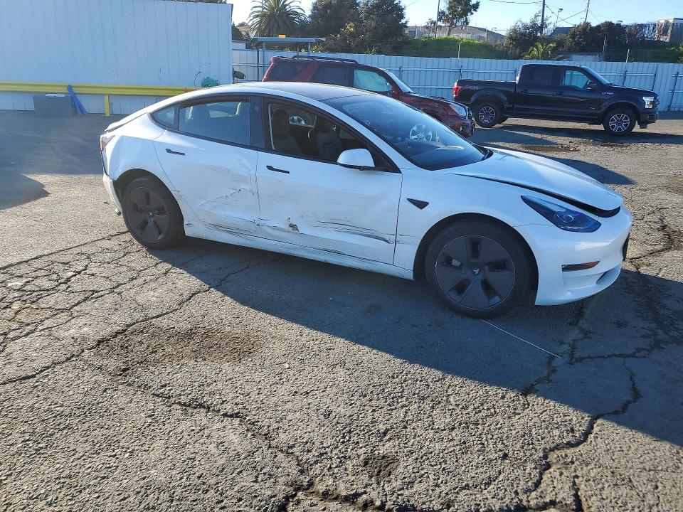 2023 Tesla Model 3 VIN 5YJ3E1EB5PF619848 COPART salvage auction — REAR END, Ca - Salvage Certificate, sold $7,600 on 2026-07-31 (photo 4)