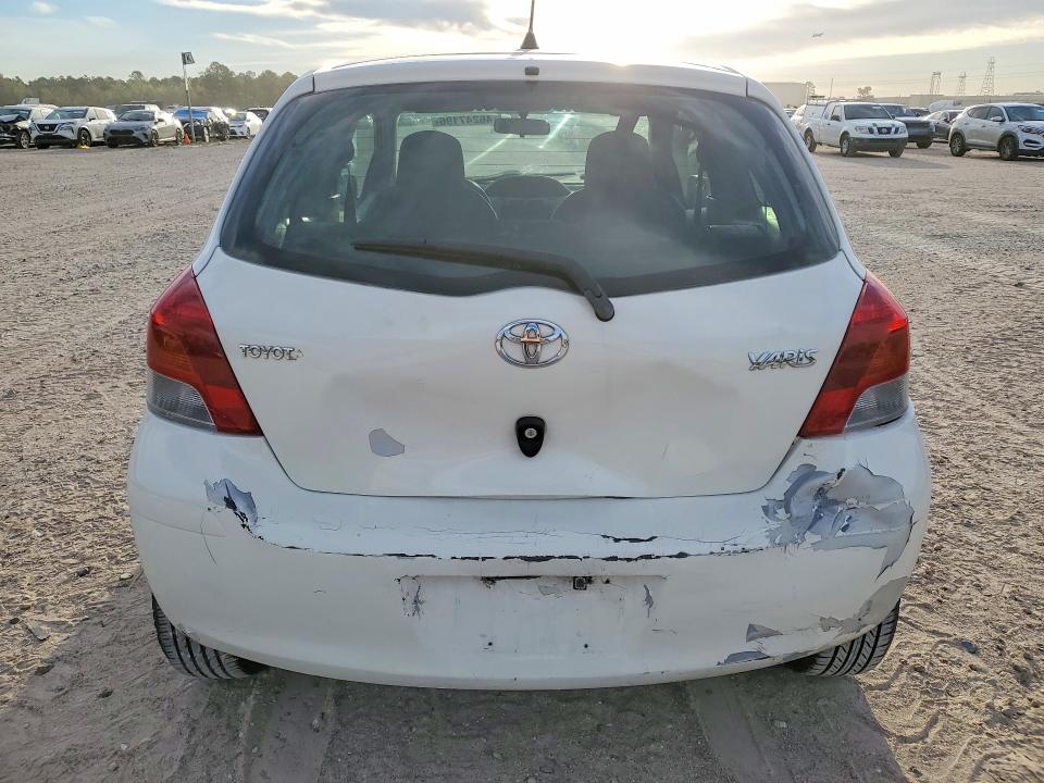 2010 Toyota Yaris VIN JTDJT4K3XA5322904 COPART salvage auction — REAR END, Tx - Salvage Vehicle Title, sold $675 on 2026-07-02 (photo 6)